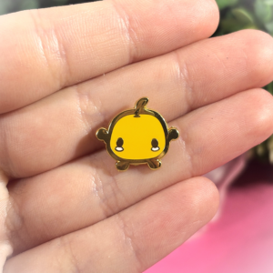 Przypinka Metalowa „Junimo #2 Pomarańczowy” – inspirowana Stardew Valley