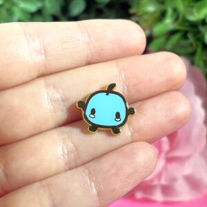 Przypinka Metalowa „Junimo #5 Niebieski” – inspirowana Stardew Valley